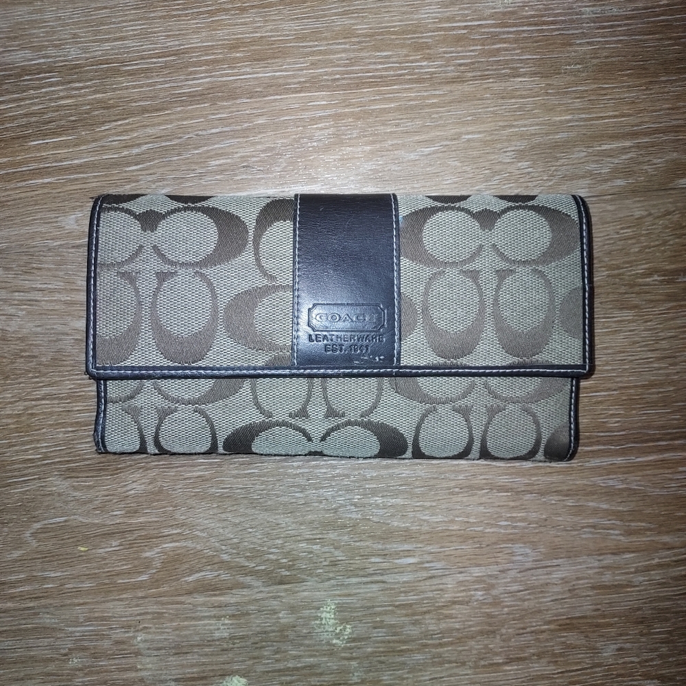 Brown coach wallet in pretty much perfect condition i just dont use it enough